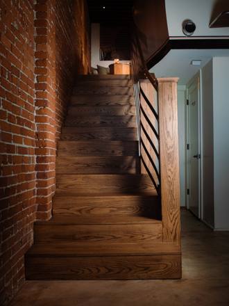 The staircase leading up to the loft lounge above Danger Bar.